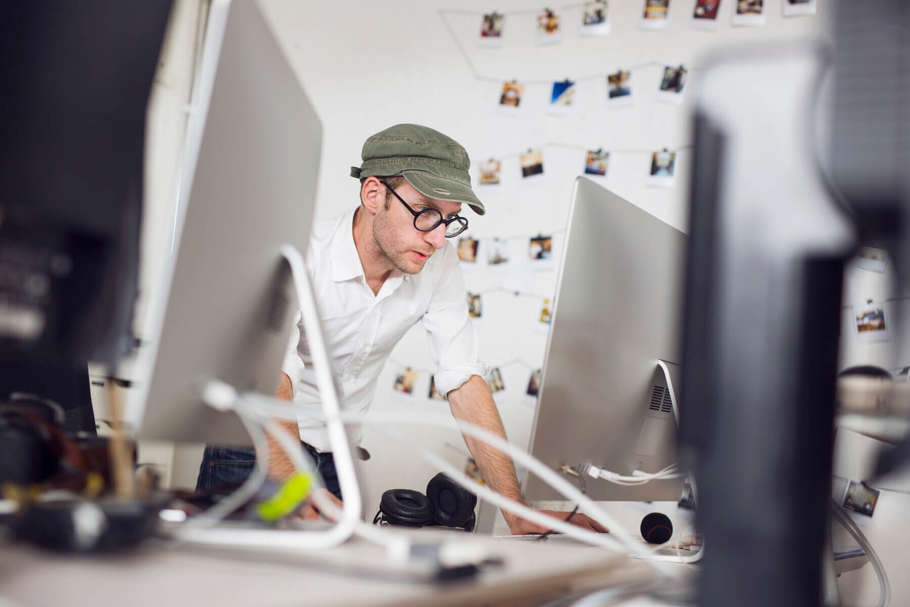 focused photographer editing photos on a computer 2024 07 08 21 20 31 utc.jpg