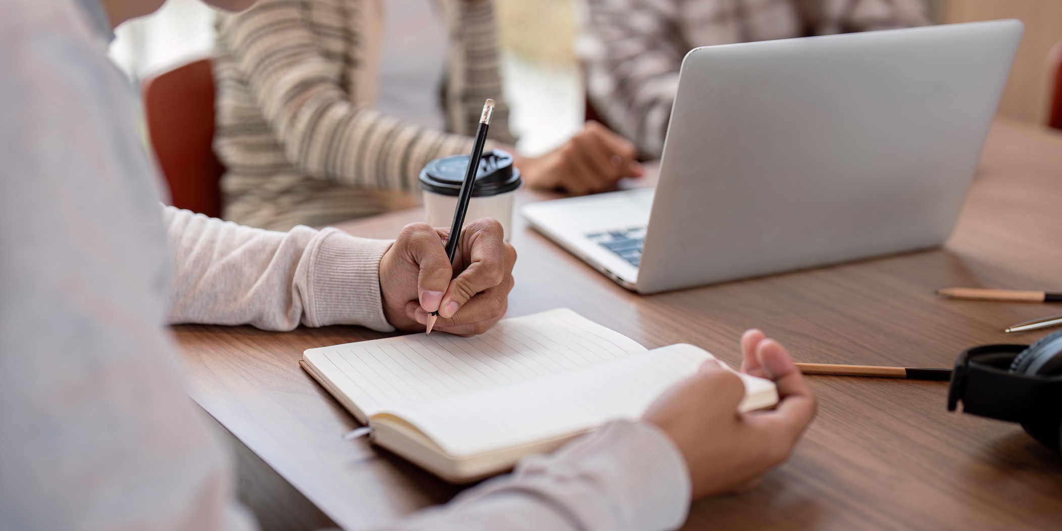focused student studying together with laptops and xqsk37l.jpg